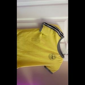 Yellow justice softball shirt kids size 12!